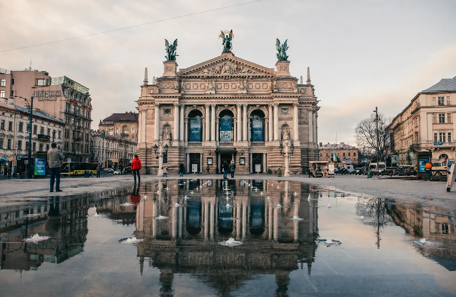 Lviv Opera House with a reflection in the water, photo by BANKHOTEL